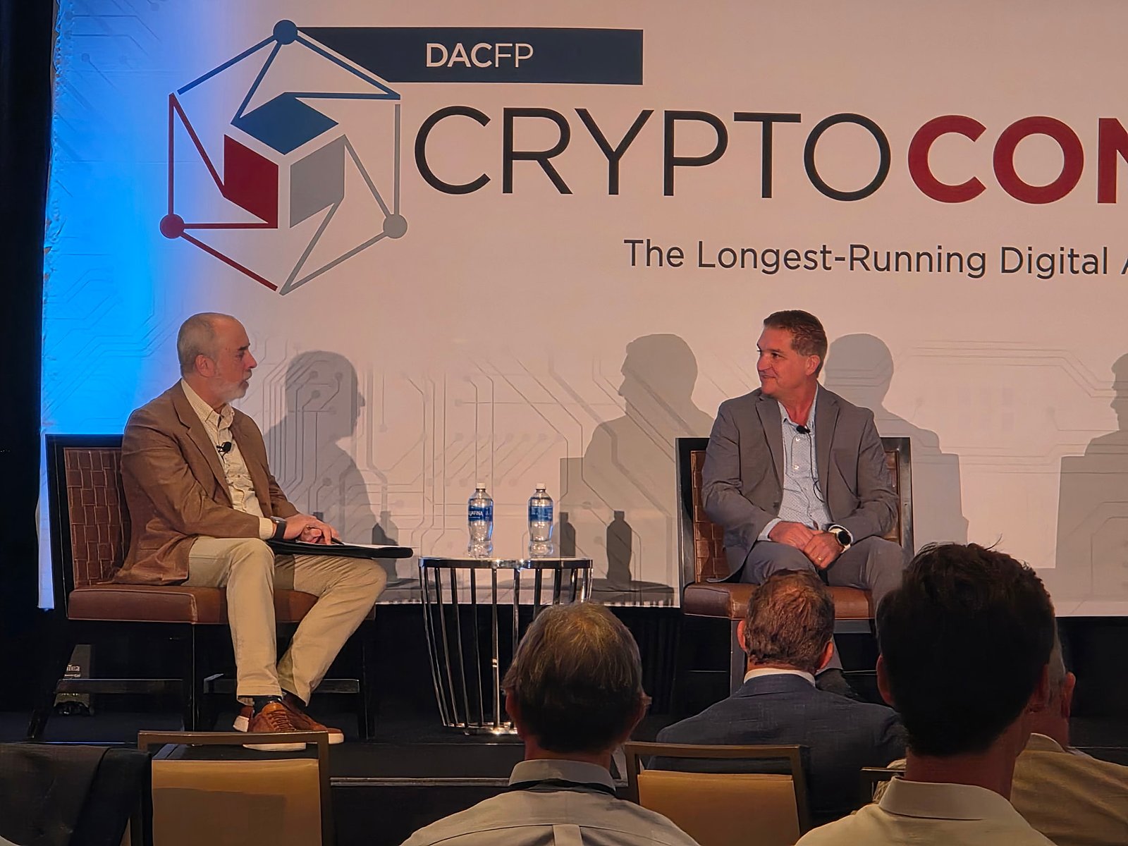 Tony Erwin on stage during a panel at the 8th Annual DACFP Crypto Convergence conference